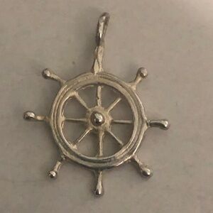 Vintage sterling silver caption’s ship wheel pendant.